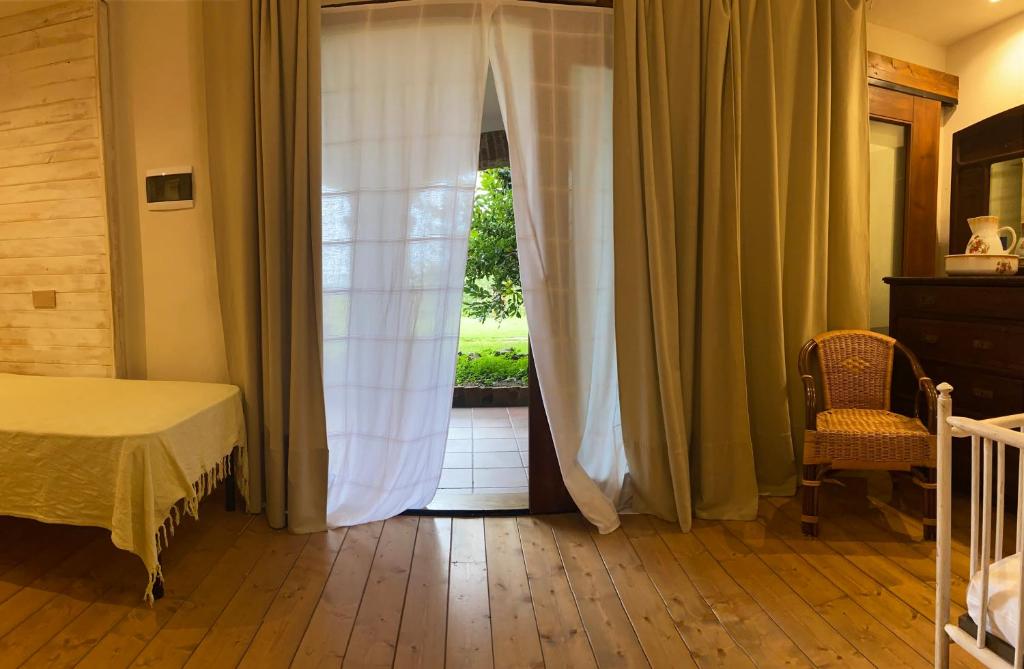 Postel nebo postele na pokoji v ubytování Al Riccio
