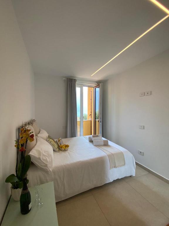 Posteľ alebo postele v izbe v ubytovaní B&B Am Gardasee blick