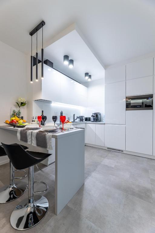 Kuchyňa alebo kuchynka v ubytovaní Leo Apartament Delux