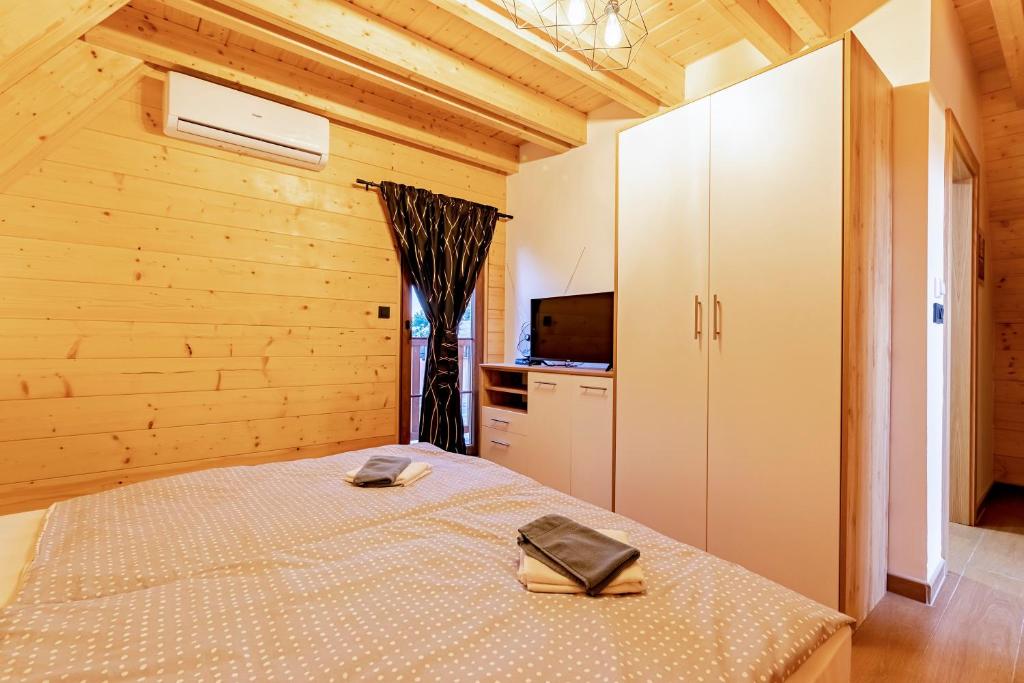 Posteľ alebo postele v izbe v ubytovaní Wood Fairy