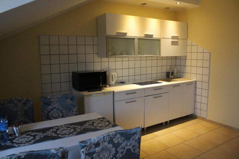 Kuchyňa alebo kuchynka v ubytovaní Restauracja Hotel Kassandra