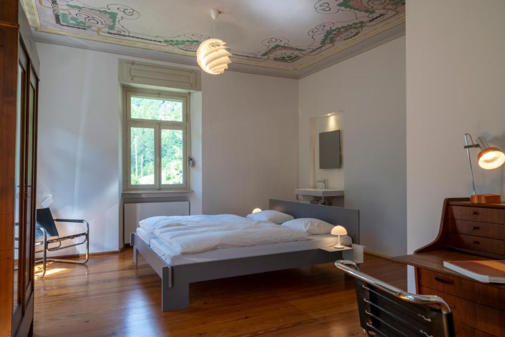 Postel nebo postele na pokoji v ubytování Villa Pineta
