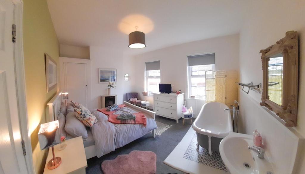 Et opholdsområde på Beautiful Victorian Terraced House