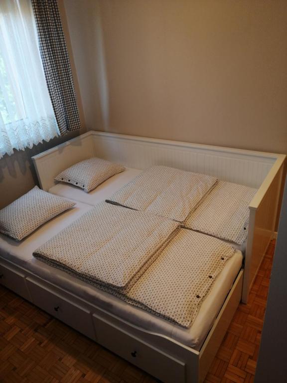 Posteľ alebo postele v izbe v ubytovaní Apartament Alga Zator