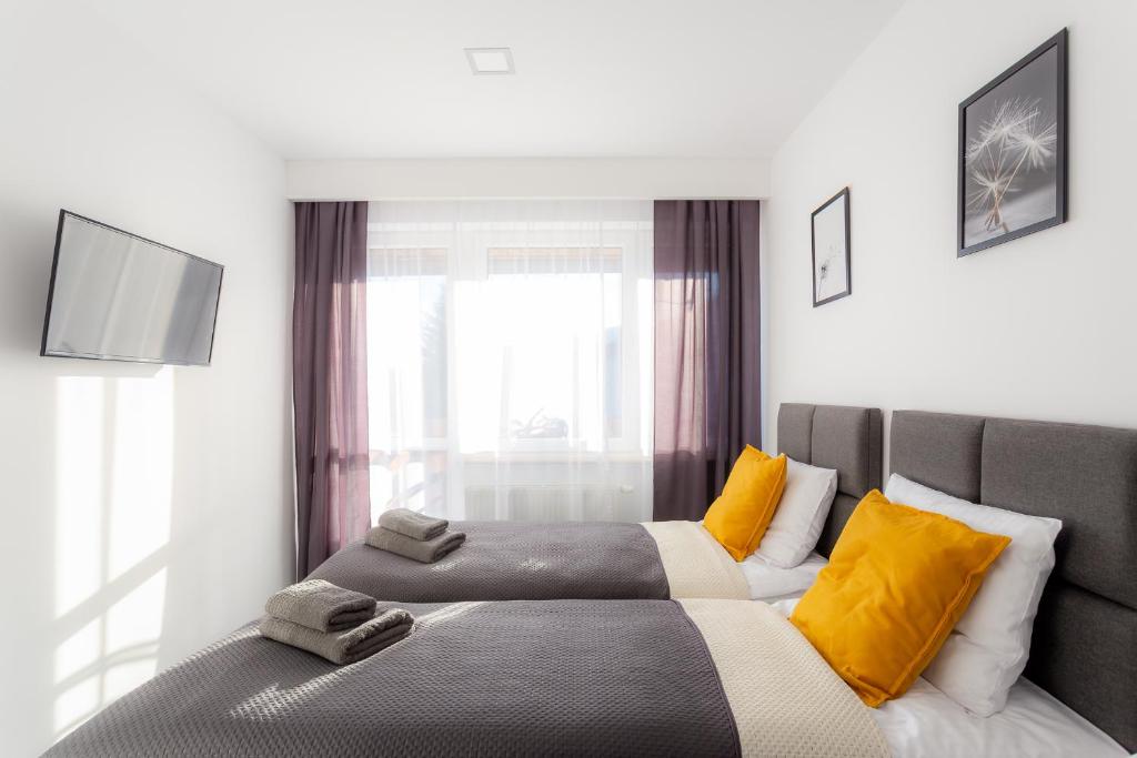 Postel nebo postele na pokoji v ubytování VILLA TO-TU