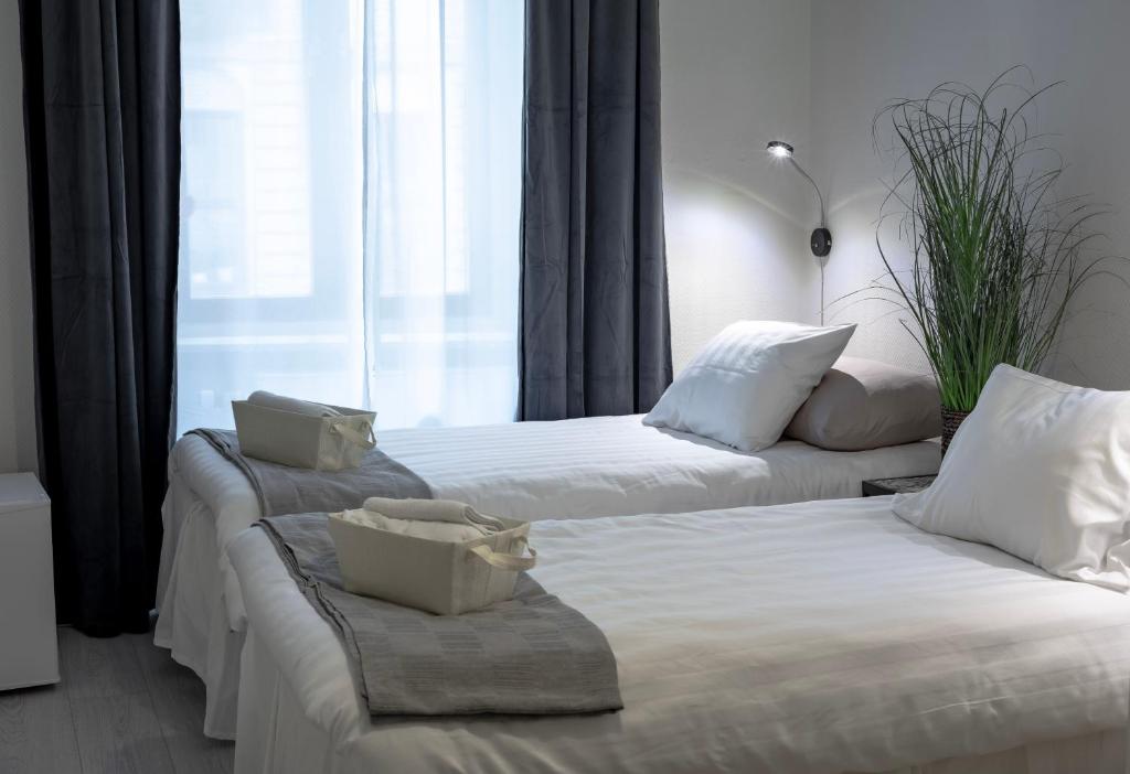 Postel nebo postele na pokoji v ubytování Hotel Lemonade
