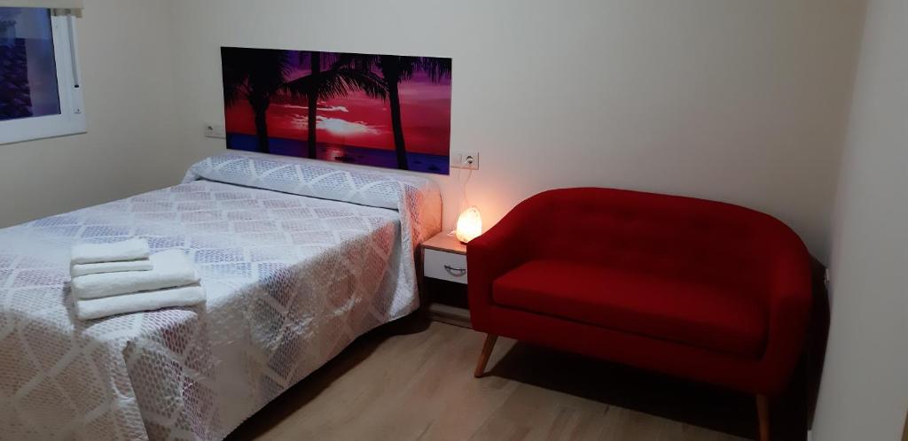 Ένα ή περισσότερα κρεβάτια σε δωμάτιο στο Piso La Buganvilla