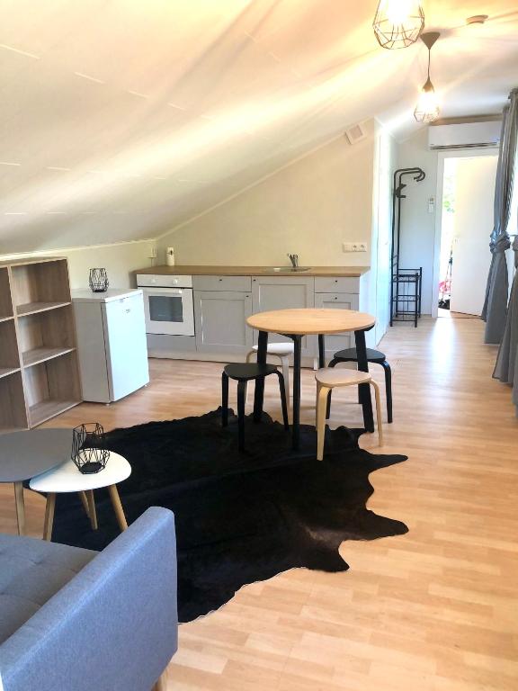 a living room with a couch and a table at Apartment Viiger in Kärdla