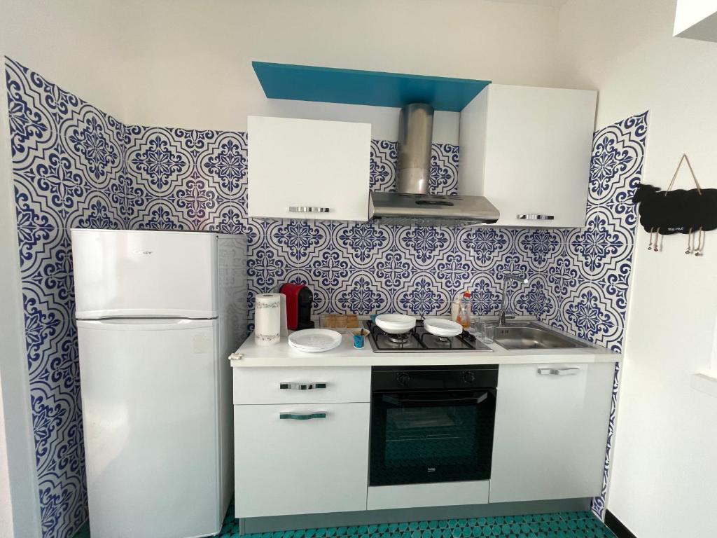 Kuchyň nebo kuchyňský kout v ubytování Villa Azzurra