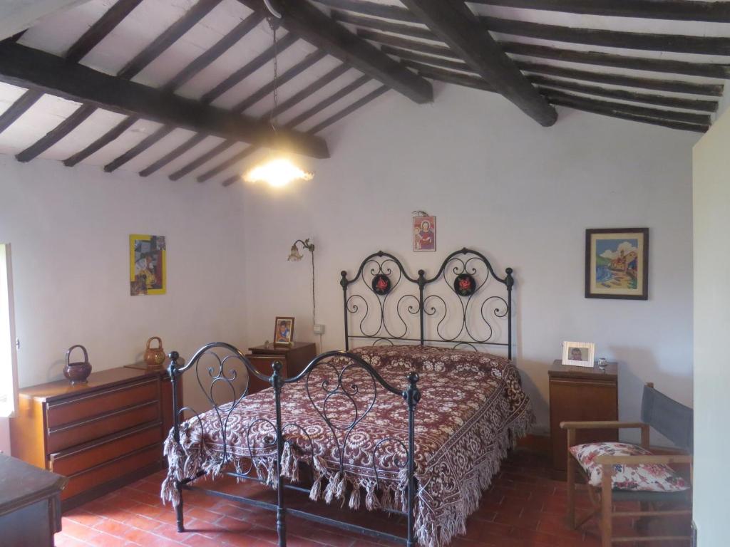 Tempat tidur dalam kamar di BeBrettino Atipico. Un into the wild tranquillo