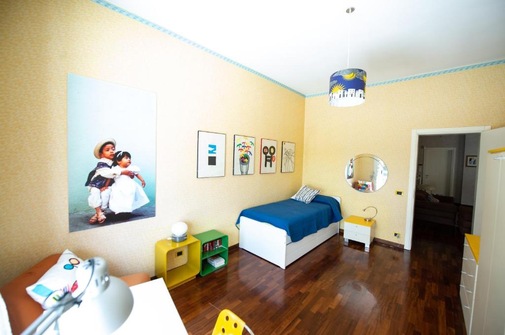 Postel nebo postele na pokoji v ubytování CASA LIBERTINI