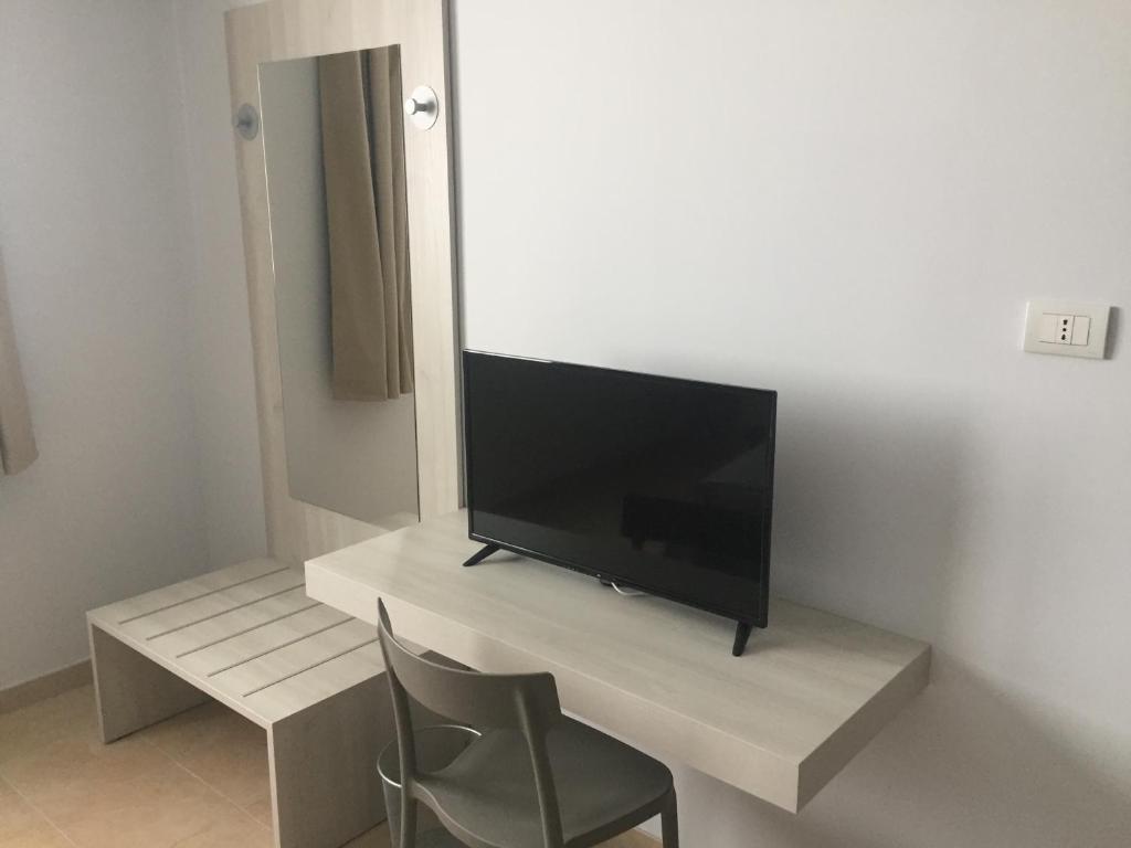 TV a/nebo společenská místnost v ubytování L'incontro