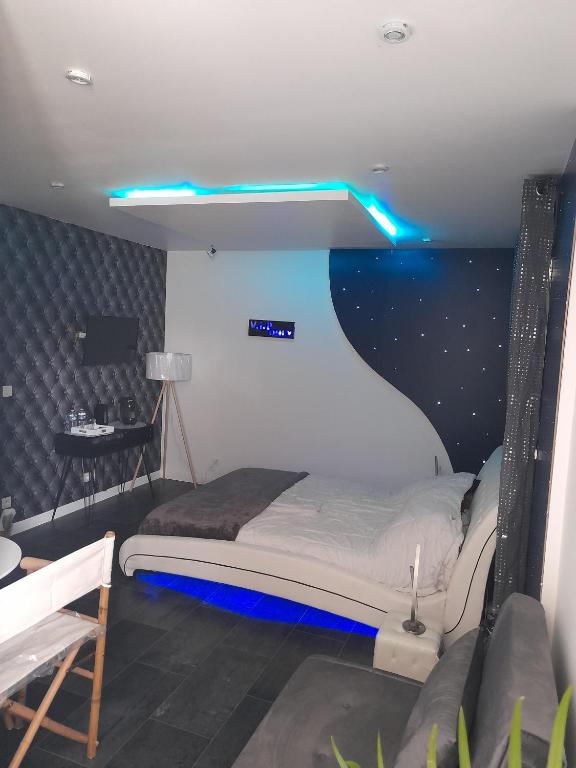 Postel nebo postele na pokoji v ubytování Chambres 2 caps