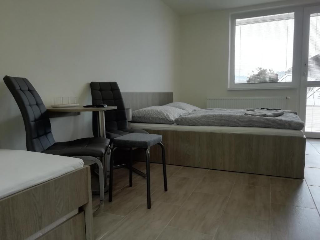 Postel nebo postele na pokoji v ubytování Vila Lada