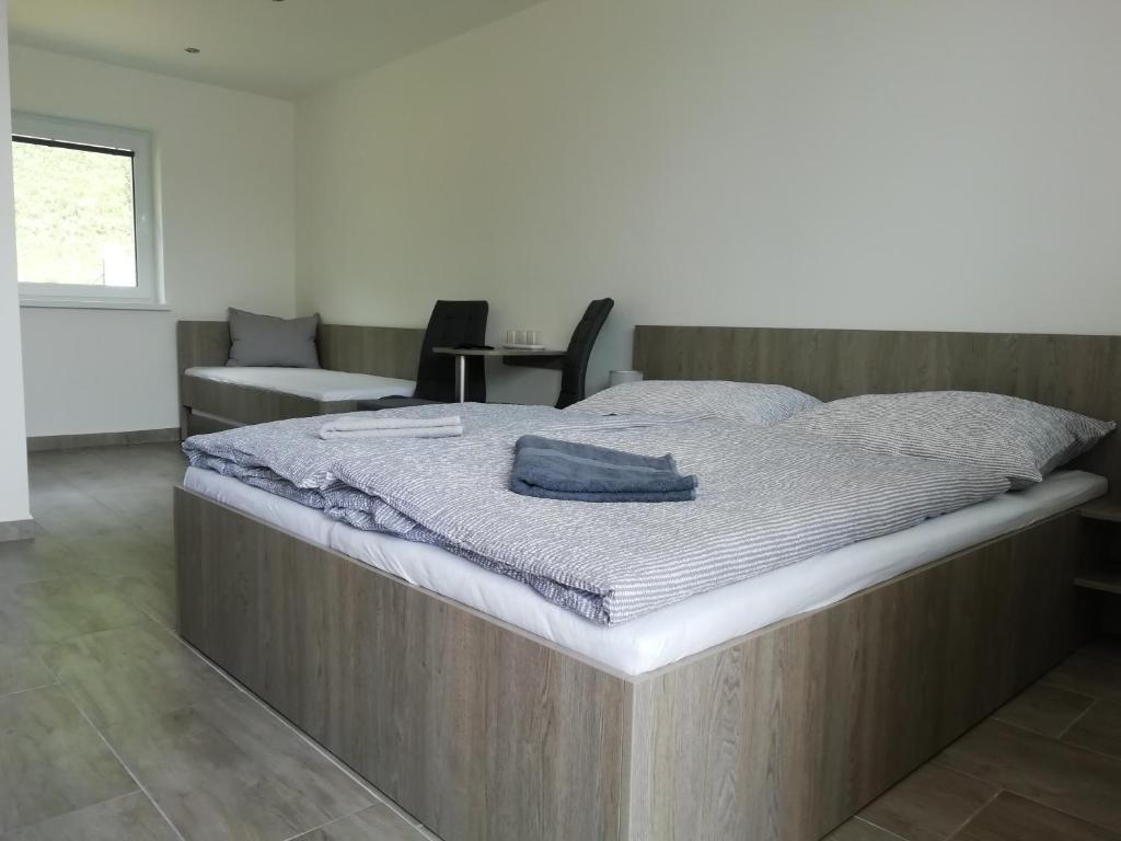 Postel nebo postele na pokoji v ubytování Vila Lada