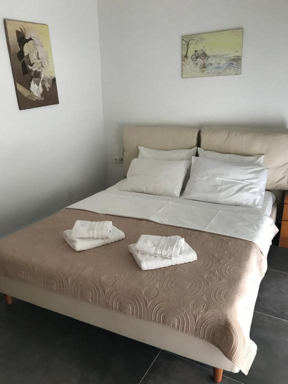 Postel nebo postele na pokoji v ubytování Apartment Michail