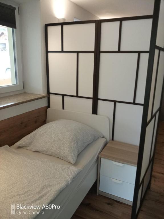 Postel nebo postele na pokoji v ubytování Gästehaus Fechheim