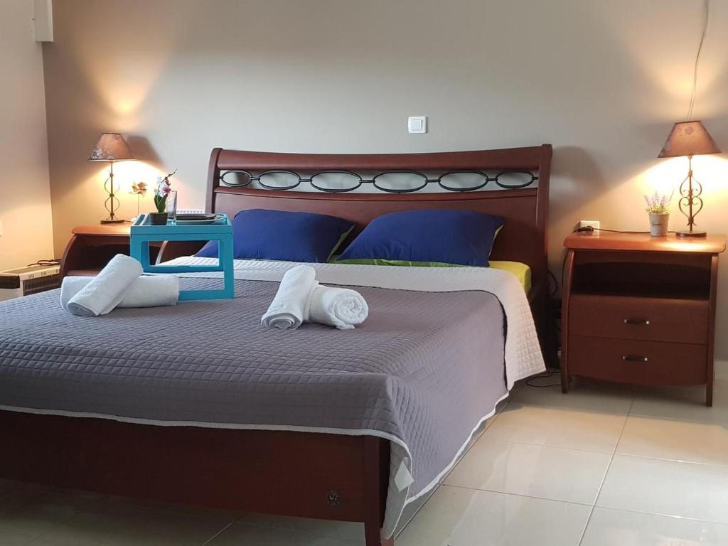 Posteľ alebo postele v izbe v ubytovaní Seaside Beach Apartment