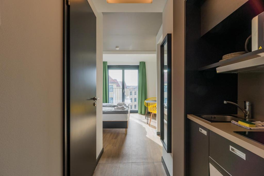 A kitchen or kitchenette at Nena Apartments - Kreuzberg 61