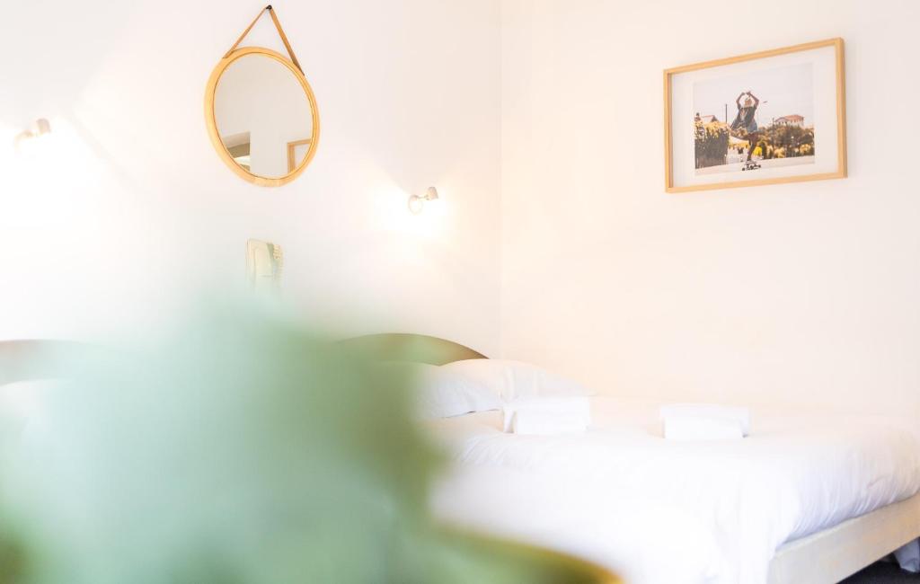 Postel nebo postele na pokoji v ubytování Hotel Bistrot FINE