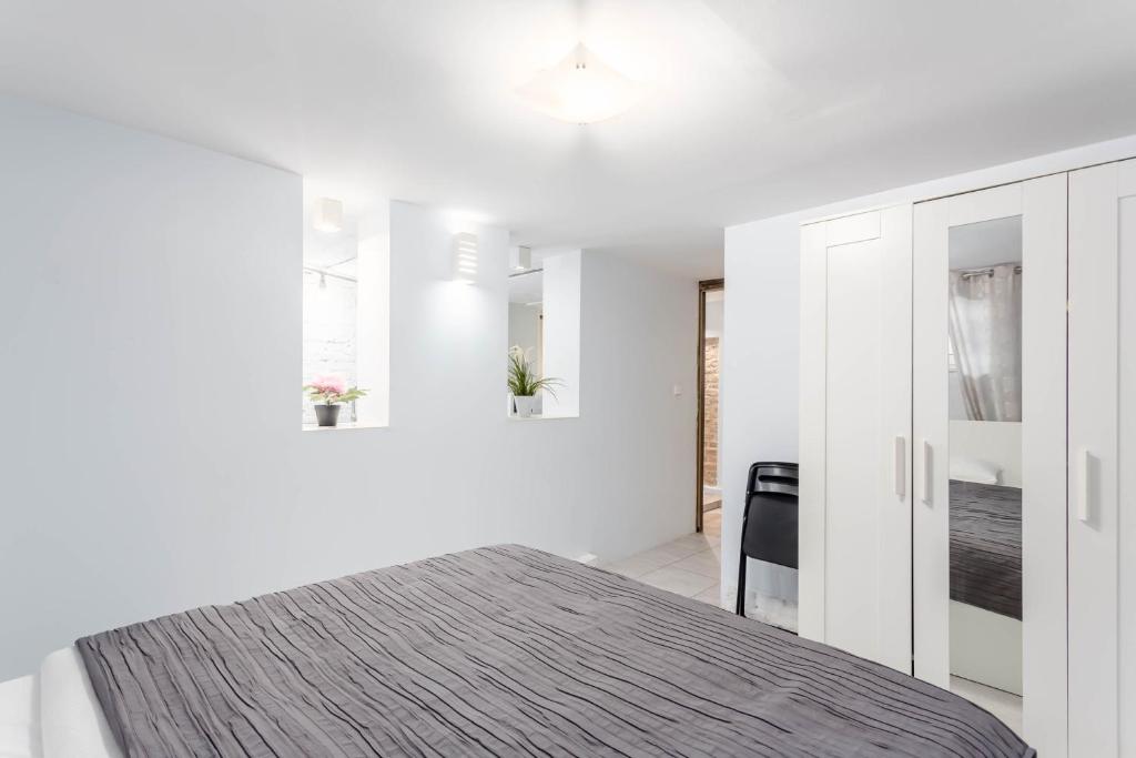 Posteľ alebo postele v izbe v ubytovaní Chill Apartments Gersona