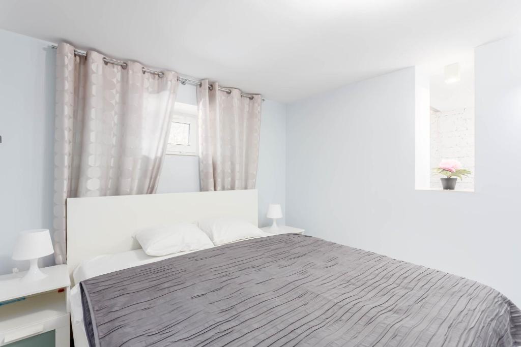 Posteľ alebo postele v izbe v ubytovaní Chill Apartments Gersona
