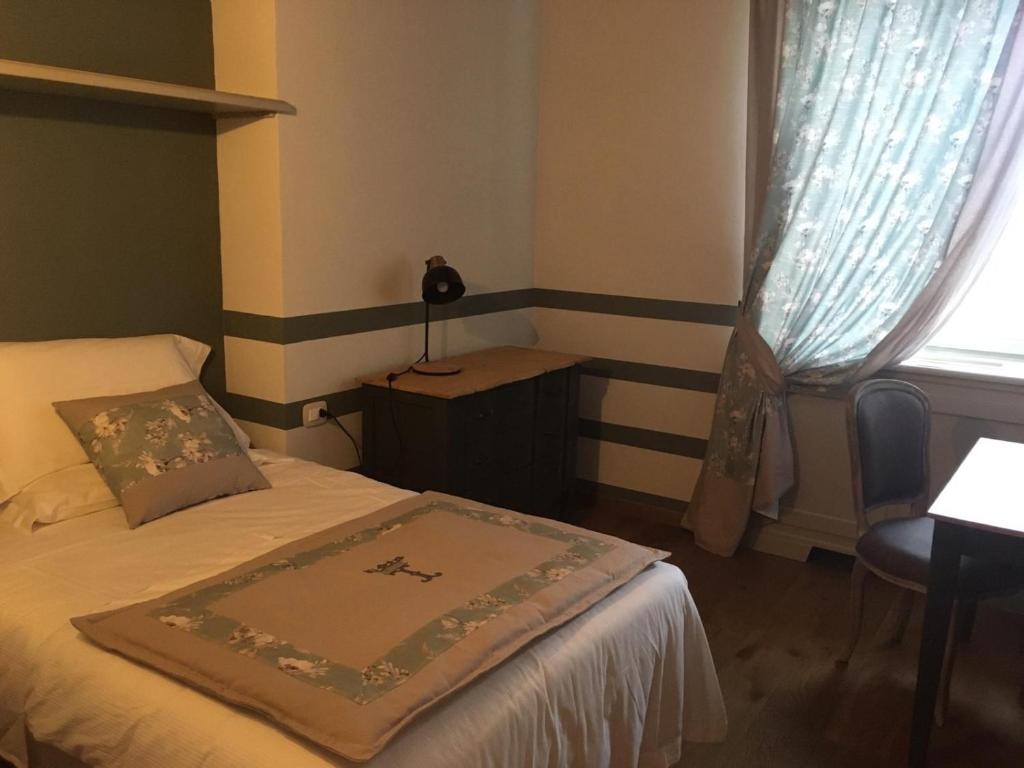 Posteľ alebo postele v izbe v ubytovaní Marchesi Incisa Winery Lodge
