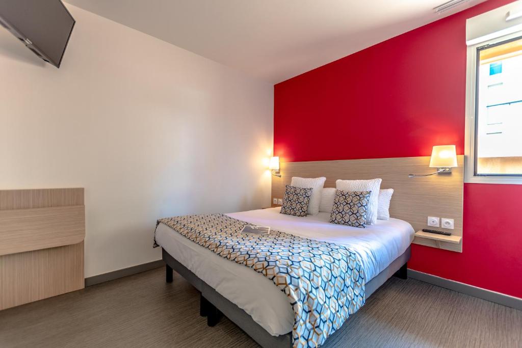 Postel nebo postele na pokoji v ubytování Hotel Le Virevent
