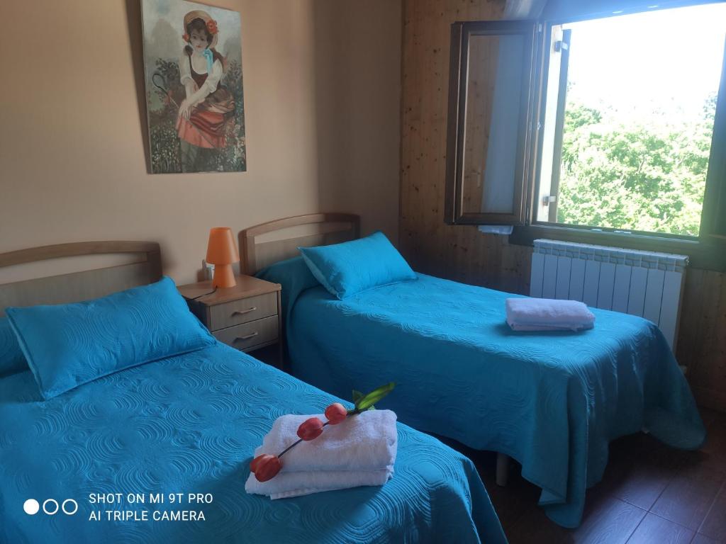 Postel nebo postele na pokoji v ubytování Apartamentos Goizeder