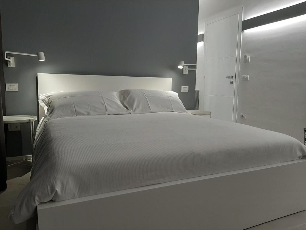 Łóżko lub łóżka w pokoju w obiekcie Kore Home