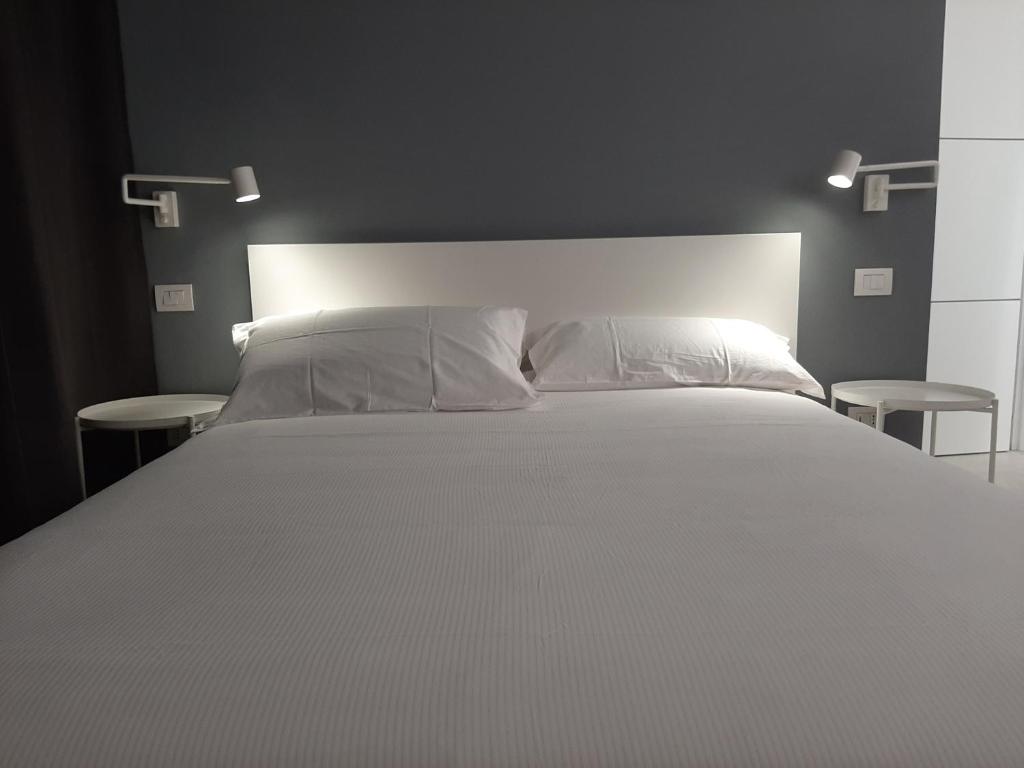 Łóżko lub łóżka w pokoju w obiekcie Kore Home