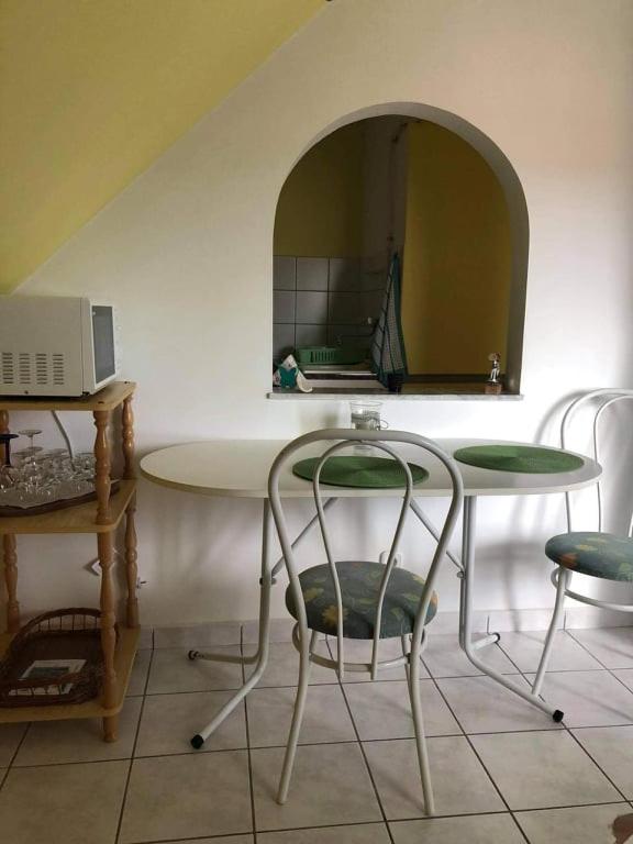 Televízia a/alebo spoločenská miestnosť v ubytovaní Major család apartman