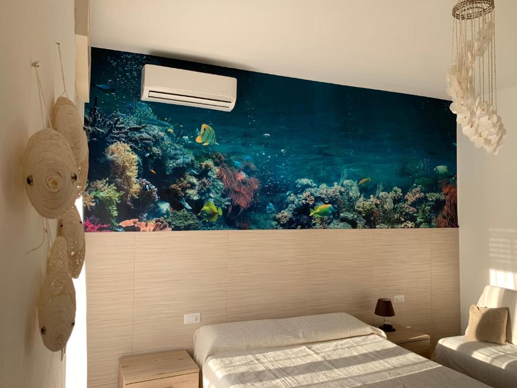 Tempat tidur dalam kamar di ATTICO GALILEI D.