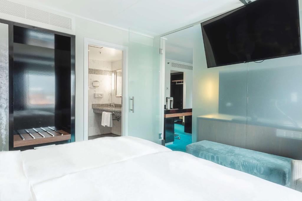 Postel nebo postele na pokoji v ubytování Radisson Blu Scandinavia Hotel Aarhus