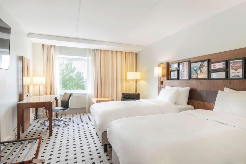 Postel nebo postele na pokoji v ubytování Radisson Blu Scandinavia Hotel Aarhus