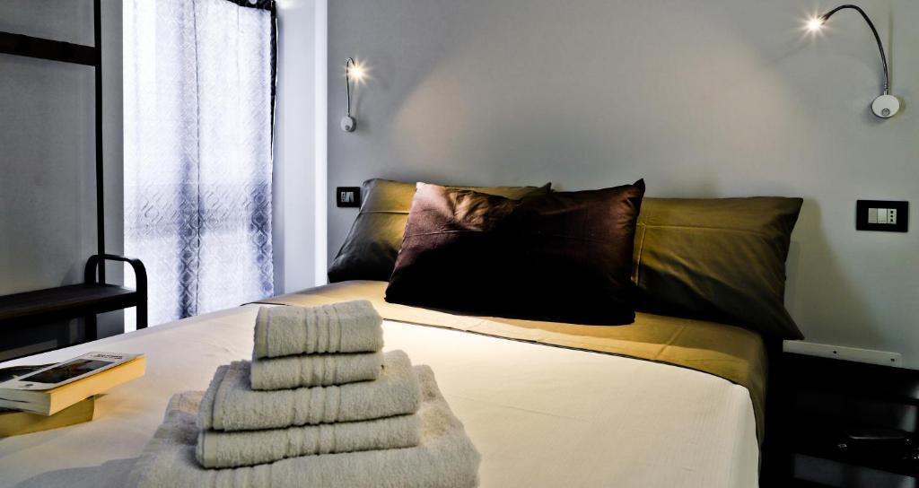 Posteľ alebo postele v izbe v ubytovaní Terra Mia Savoia B&B