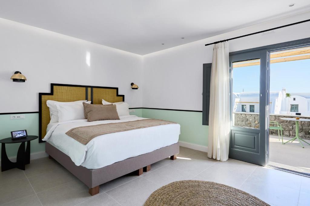 Posteľ alebo postele v izbe v ubytovaní Alleys All-Suite Hotel & Spa