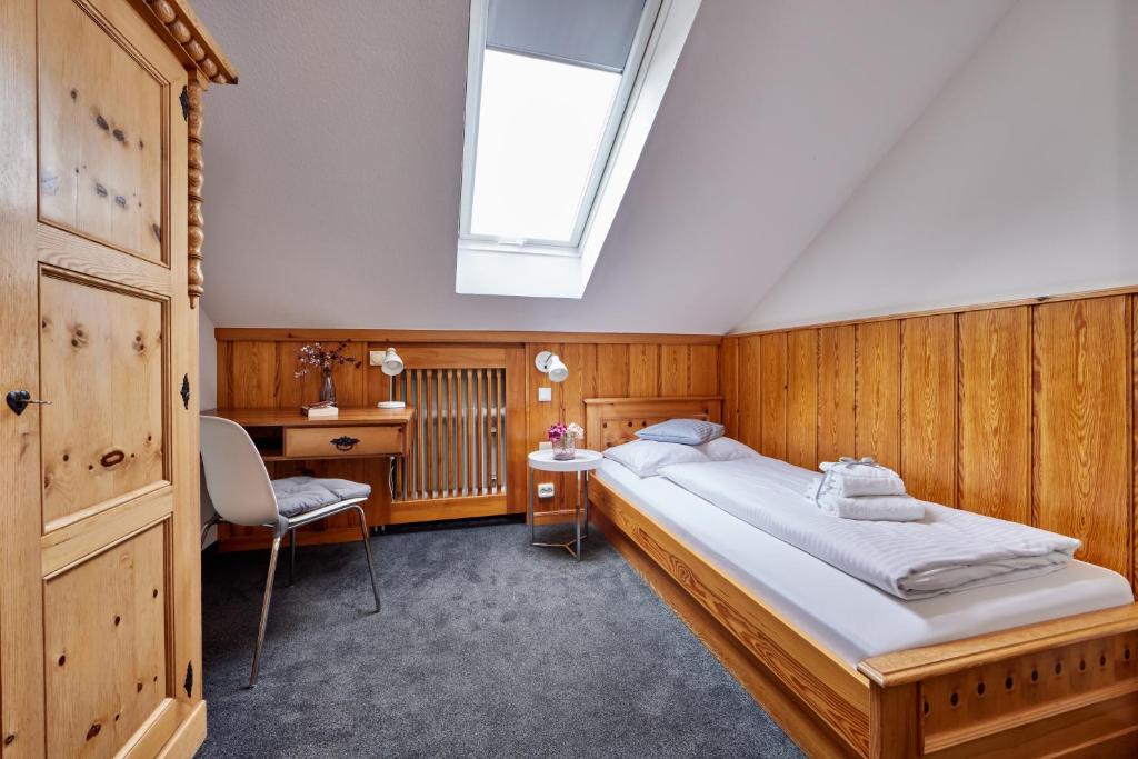 Postel nebo postele na pokoji v ubytování Hotel Alter Wirth