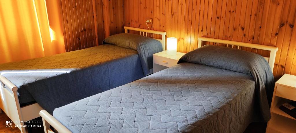 Postel nebo postele na pokoji v ubytování Albergo Centrale Scanno