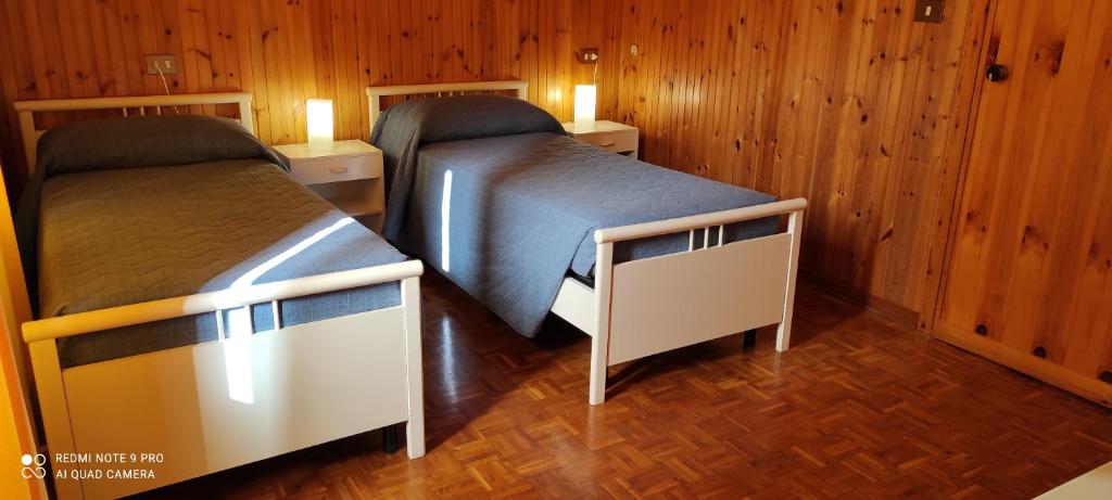 Postel nebo postele na pokoji v ubytování Albergo Centrale Scanno