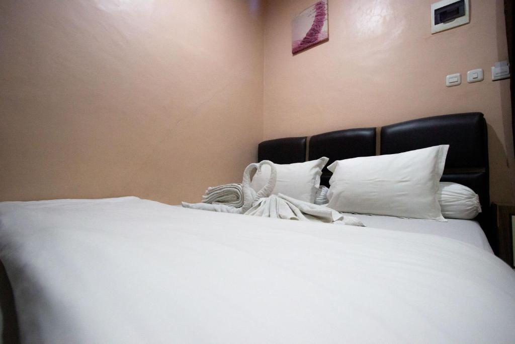 Postel nebo postele na pokoji v ubytování O2 Residence