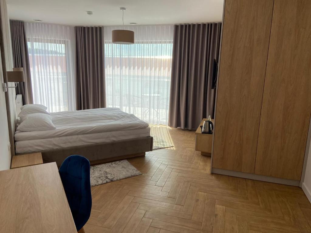Postel nebo postele na pokoji v ubytování Hotel Sebory