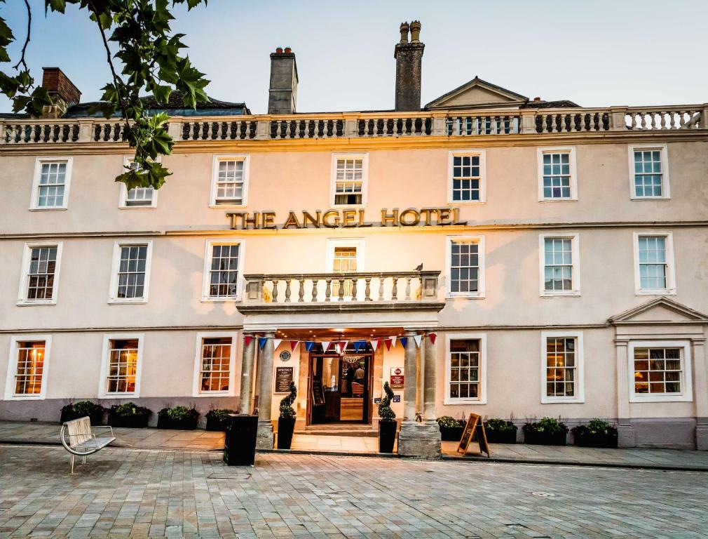 a hotel in oxfordshire with a sign that reads the angel hotel at Best Western Plus Angel Hotel in Chippenham