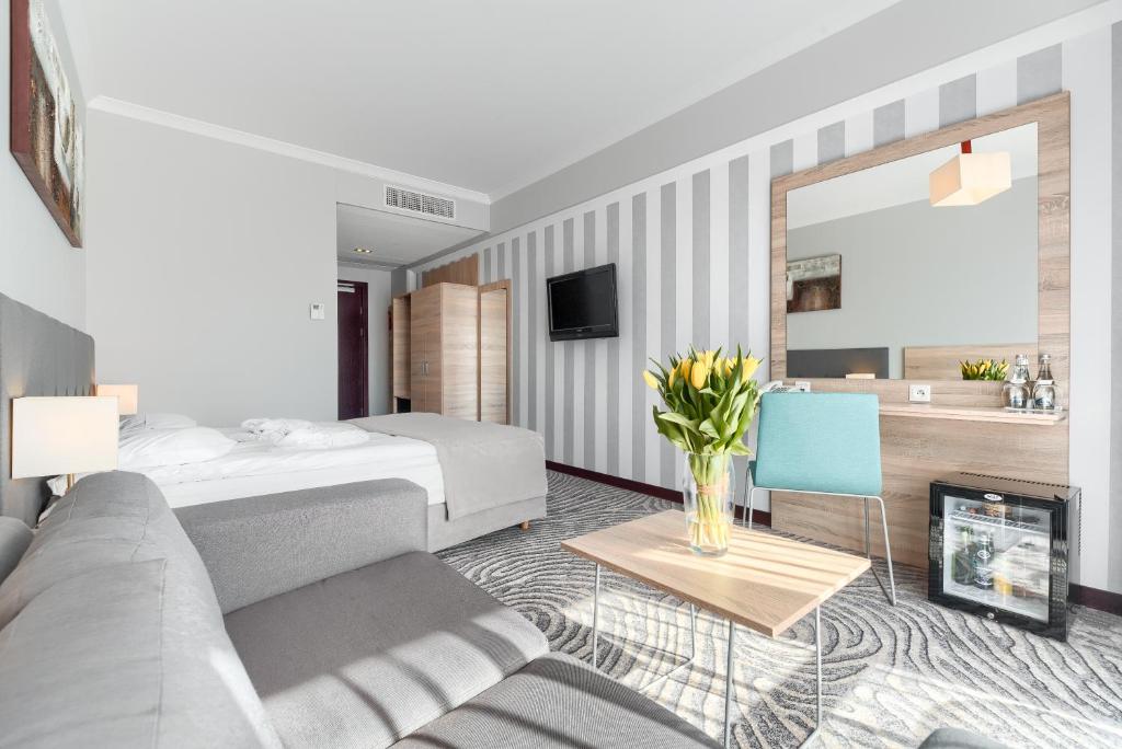 TV a/nebo společenská místnost v ubytování Hotel Leda Spa - Adults Only
