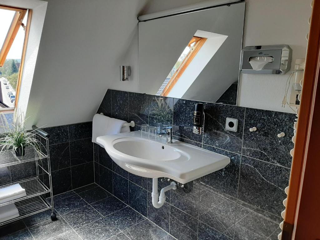 Koupelna v ubytování Hotel Daucher