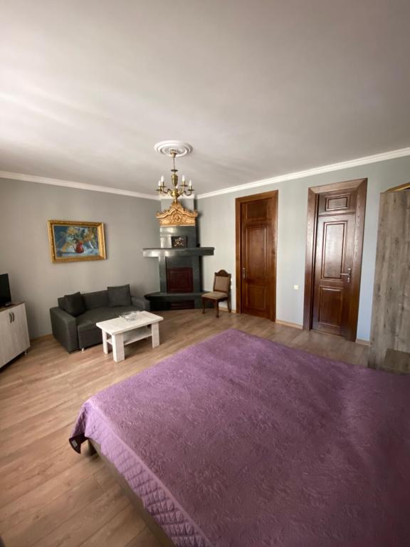 Postel nebo postele na pokoji v ubytování Cozy Studio on Europe Square