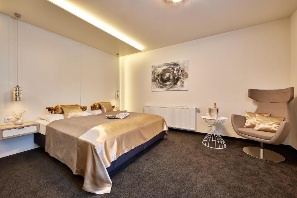 Postel nebo postele na pokoji v ubytování Hotel Alter Wirth
