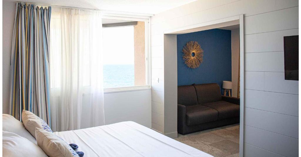 Postel nebo postele na pokoji v ubytování Hotel Port Marine