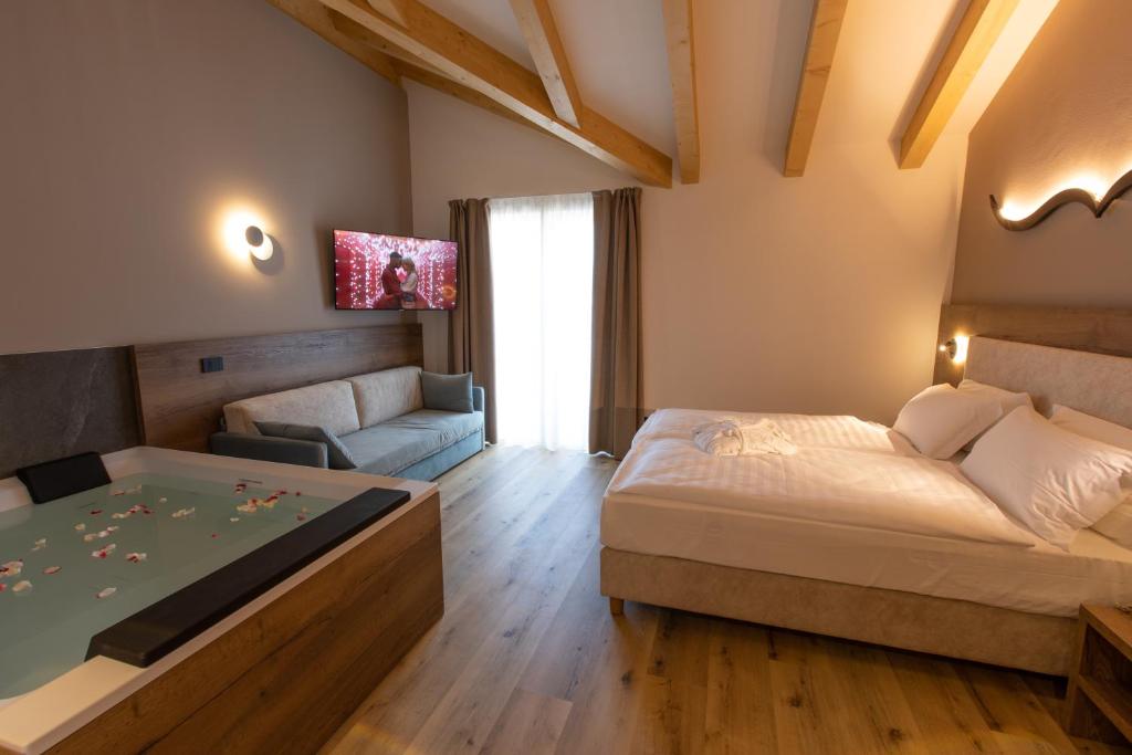 Postel nebo postele na pokoji v ubytování Àlia Bianca Active & Family Hotel