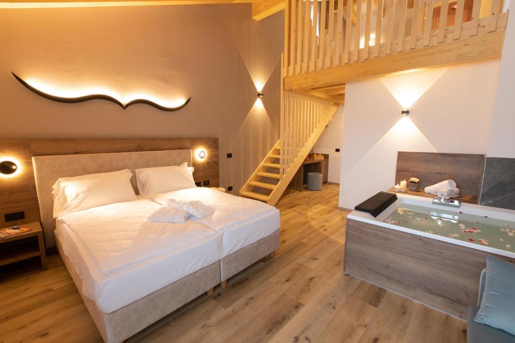 Postel nebo postele na pokoji v ubytování Àlia Bianca Active & Family Hotel